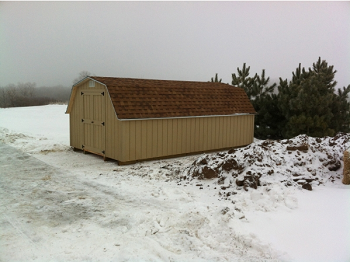 Vehicle storage in the winter right on your property! Large storage built for golf carts or vehicles
